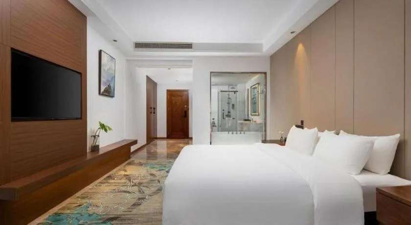 Bed in GME Taizhou Jingjiang City Bus Station Hotel