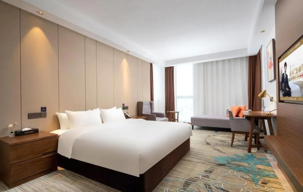 Bed in GME Taizhou Jingjiang City Bus Station Hotel