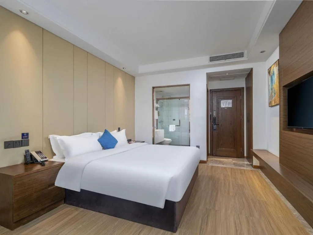 Bed in GME Taizhou Jingjiang City Bus Station Hotel