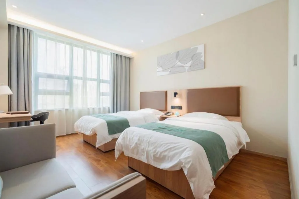 Bed in GreenTree Inn Wuxi Quanshan Center