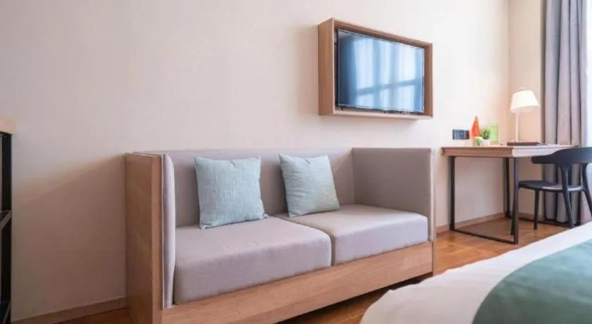 Bed in GreenTree Inn Wuxi Quanshan Center