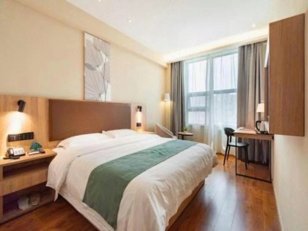 Bed in GreenTree Inn Wuxi Quanshan Center