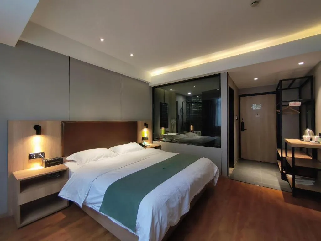 Bed in GreenTree Inn Wuxi Quanshan Center