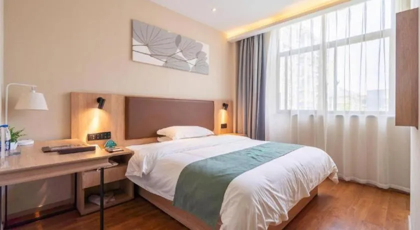 Bed in GreenTree Inn Wuxi Quanshan Center