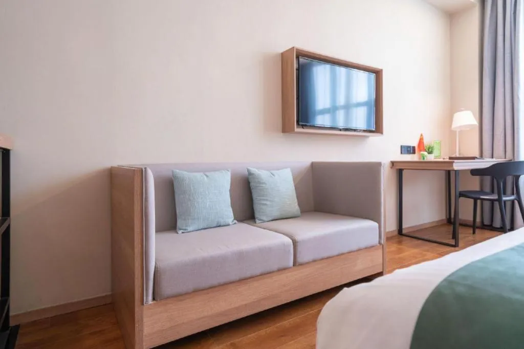 Bed in GreenTree Inn Wuxi Quanshan Center