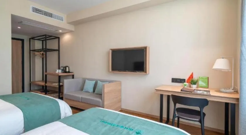Bed in GreenTree Inn Wuxi Quanshan Center