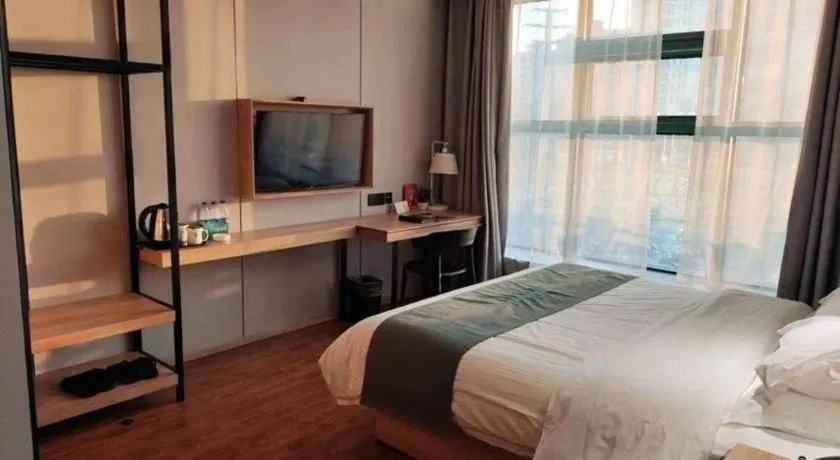 Bed in GreenTree Inn Wuxi Quanshan Center