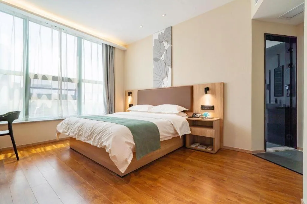 Bed in GreenTree Inn Wuxi Quanshan Center