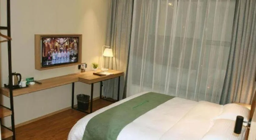 Bed in GreenTree Inn Wuxi Quanshan Center