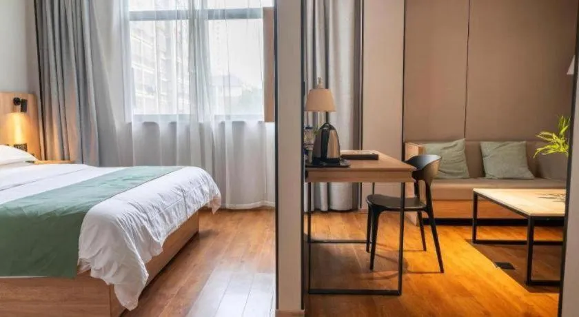 Bed in GreenTree Inn Wuxi Quanshan Center