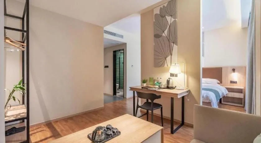 Bed in GreenTree Inn Wuxi Quanshan Center