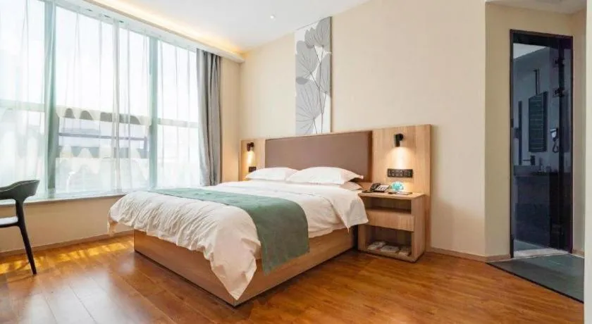 Bed in GreenTree Inn Wuxi Quanshan Center