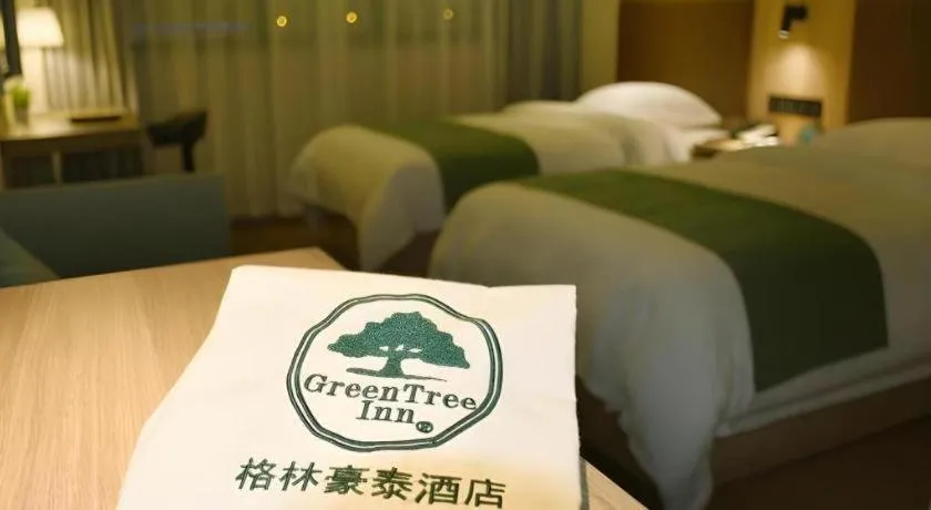 Bed in GreenTree Inn Wuxi Quanshan Center