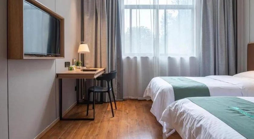 Bed in GreenTree Inn Wuxi Quanshan Center