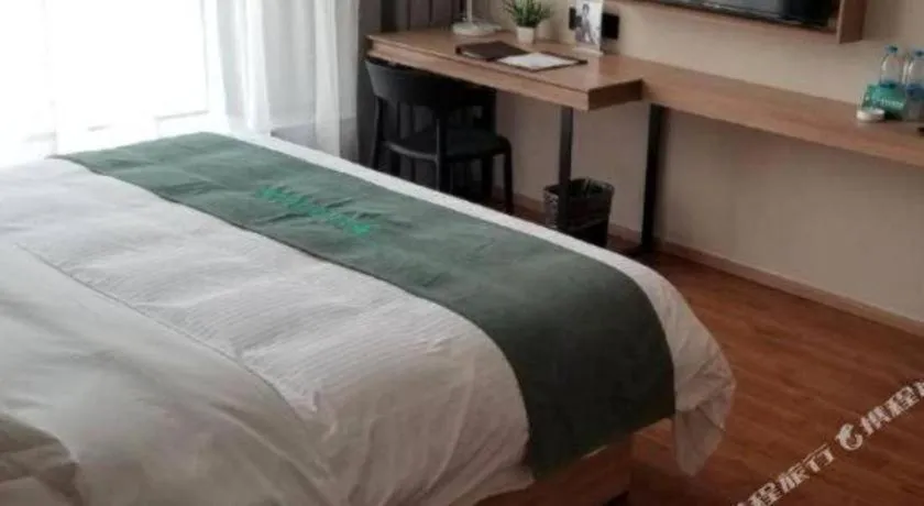 Bed in GreenTree Inn Wuxi Quanshan Center