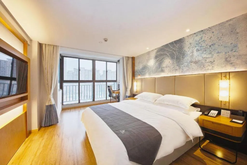 Bed in GreenTree Eastern Hotel Huai'an Bus Station Zhou Enlai Memorial