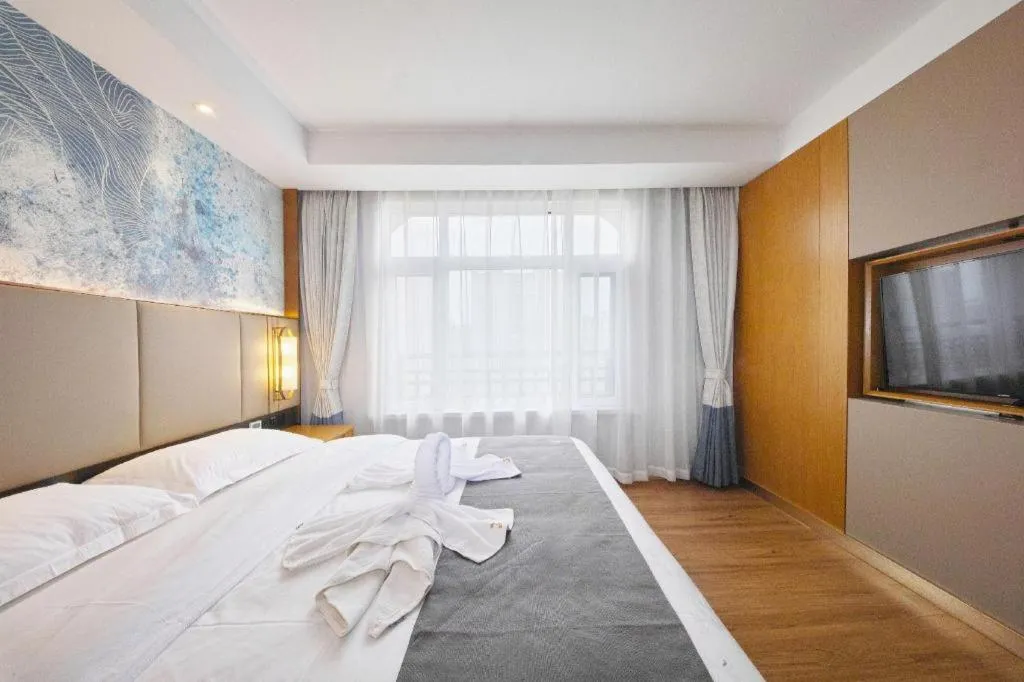 Bed in GreenTree Eastern Hotel Huai'an Bus Station Zhou Enlai Memorial