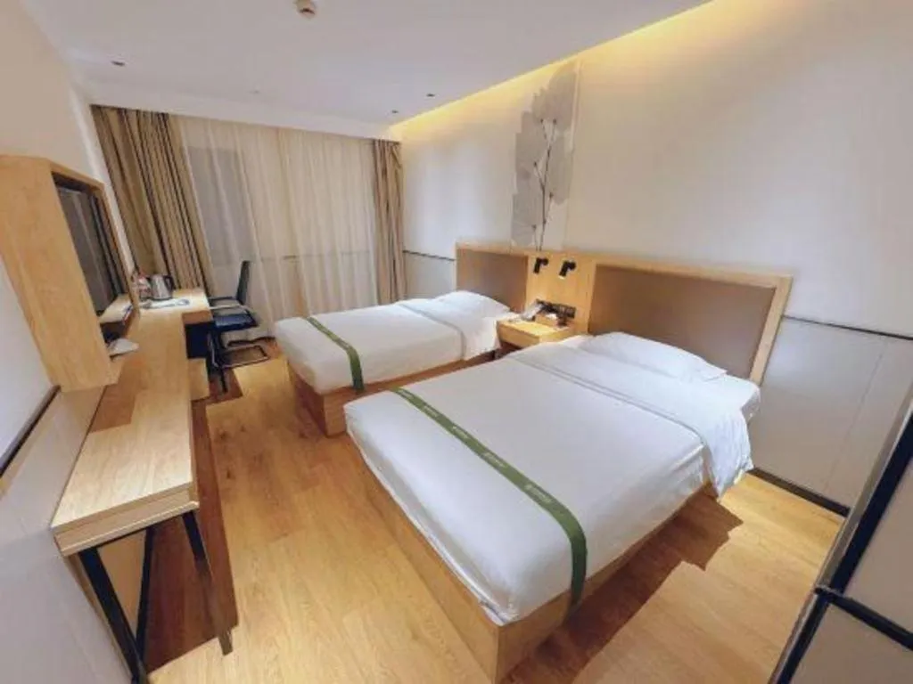 Bed in GreenTree Inn Nanjing Baijiahu