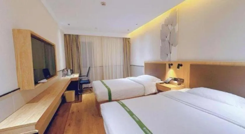 Bed in GreenTree Inn Nanjing Baijiahu