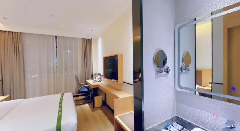 Bed in GreenTree Inn Nanjing Baijiahu