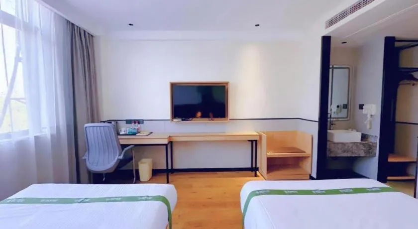 Bed in GreenTree Inn Nanjing Baijiahu