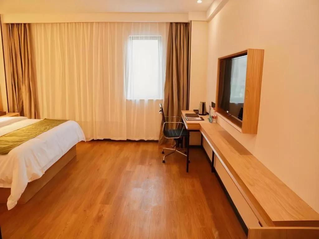 Bed in GreenTree Inn Nanjing Baijiahu