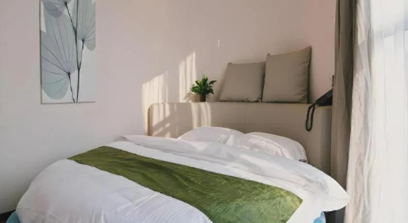 Bed in GreenTree Inn Nanjing Baijiahu