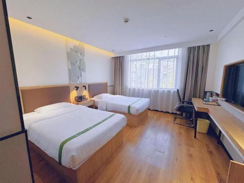 Bed in GreenTree Inn Nanjing Baijiahu