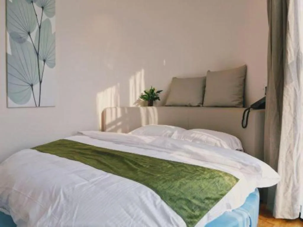 Bed in GreenTree Inn Nanjing Baijiahu