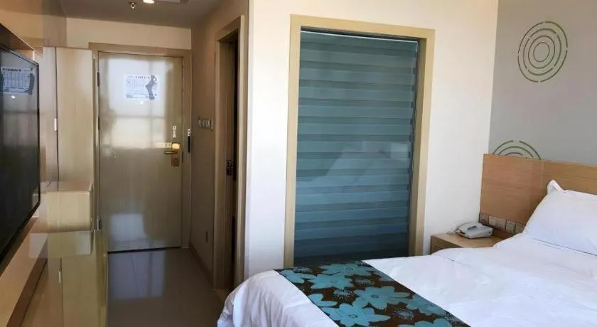 Bed in GreenTree Inn Urumqi Airport Tianyi International City