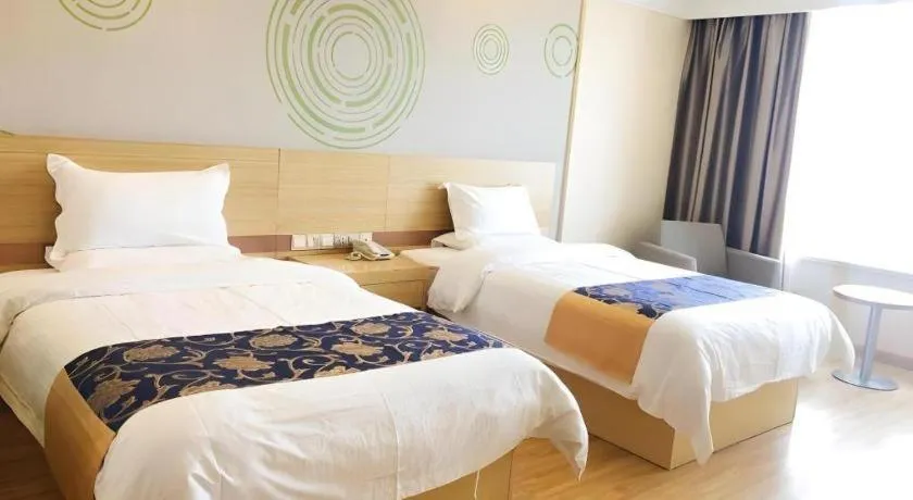 Bed in GreenTree Inn Urumqi Airport Tianyi International City