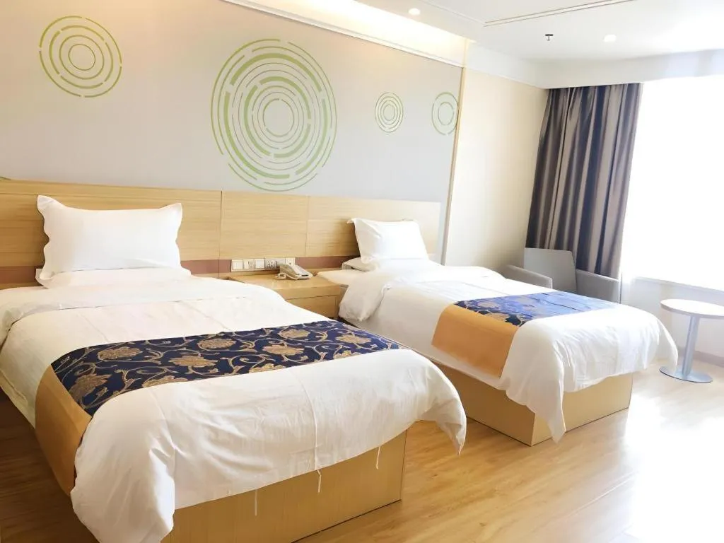 Bed in GreenTree Inn Urumqi Airport Tianyi International City