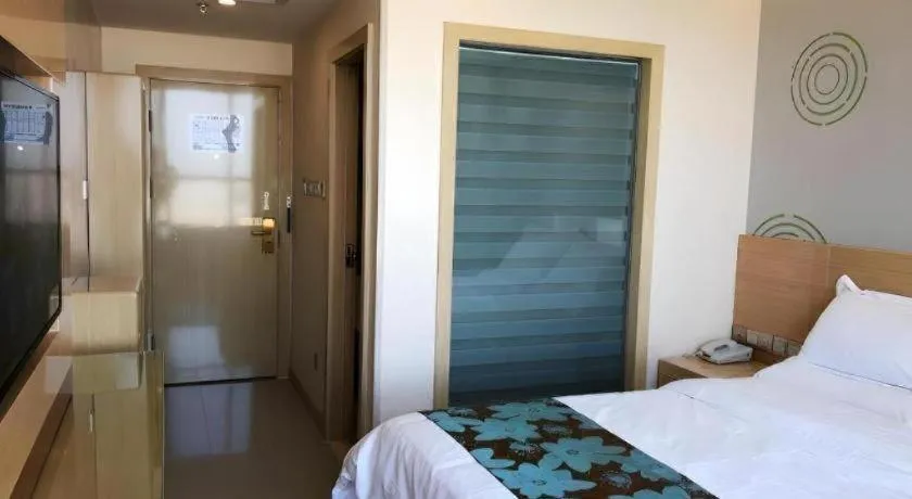 Bed in GreenTree Inn Urumqi Airport Tianyi International City