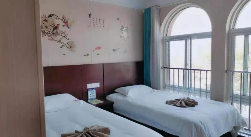Bed in Shell Zaozhuang Taierzhuang Ancient City East Gate Hotel