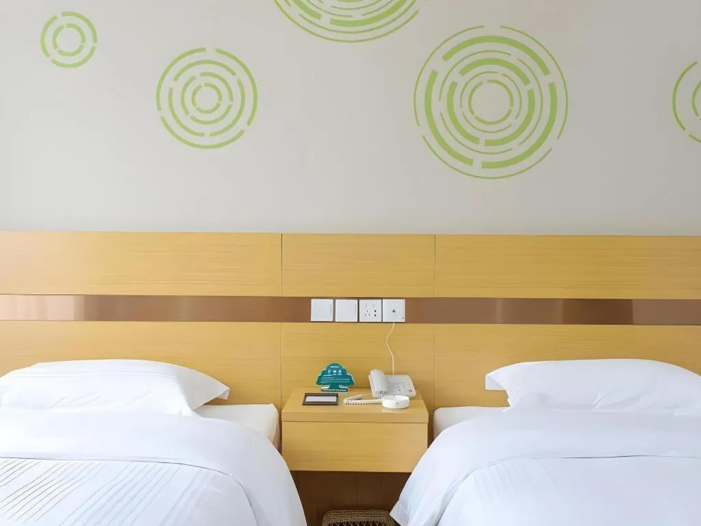 Bed in GreenTree Inn Jiaxin Puyuan Kaixuan Road