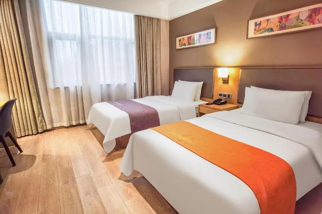 Bed in Home Inn Plus Shanghai Middle Ring Jinshajiang Road Fengzhuang Metro Station