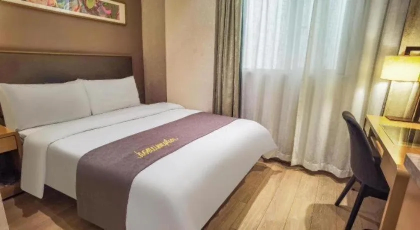 Bed in Home Inn Plus Shanghai Middle Ring Jinshajiang Road Fengzhuang Metro Station
