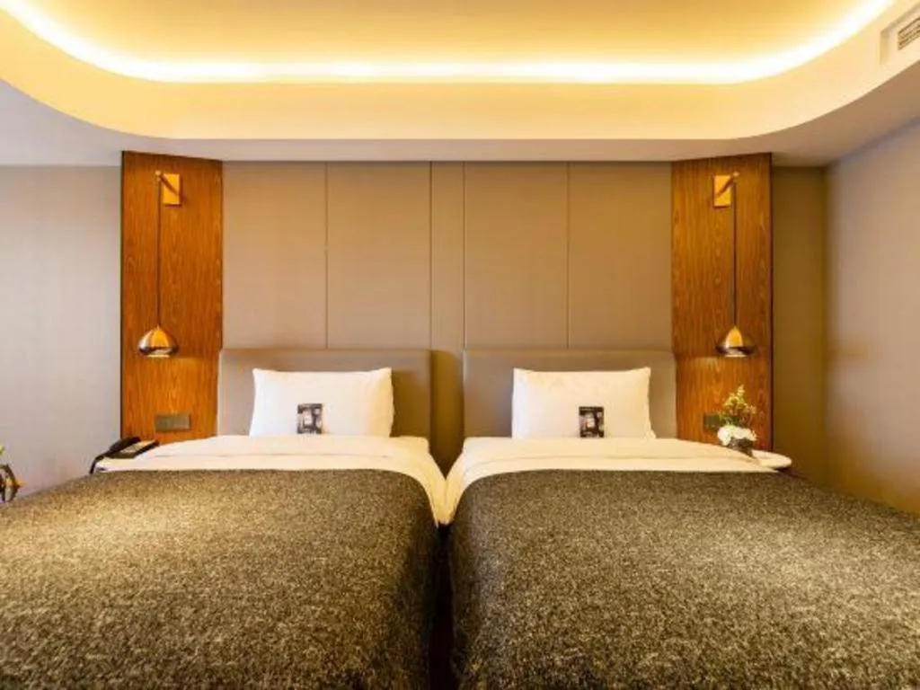 Bed in Yitel Collection Shenyang Hunnan Olympic Sports Center Caixia Street Metro Station