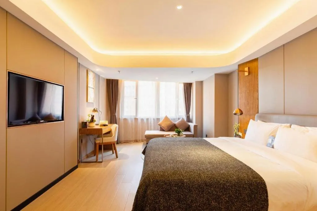 Bed in Yitel Collection Shenyang Hunnan Olympic Sports Center Caixia Street Metro Station