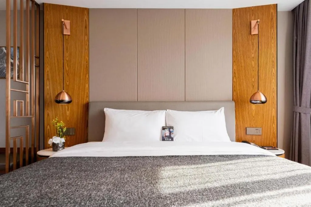 Bed in Yitel Collection Shenyang Hunnan Olympic Sports Center Caixia Street Metro Station