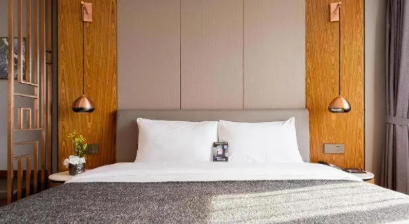 Bed in Yitel Collection Shenyang Hunnan Olympic Sports Center Caixia Street Metro Station