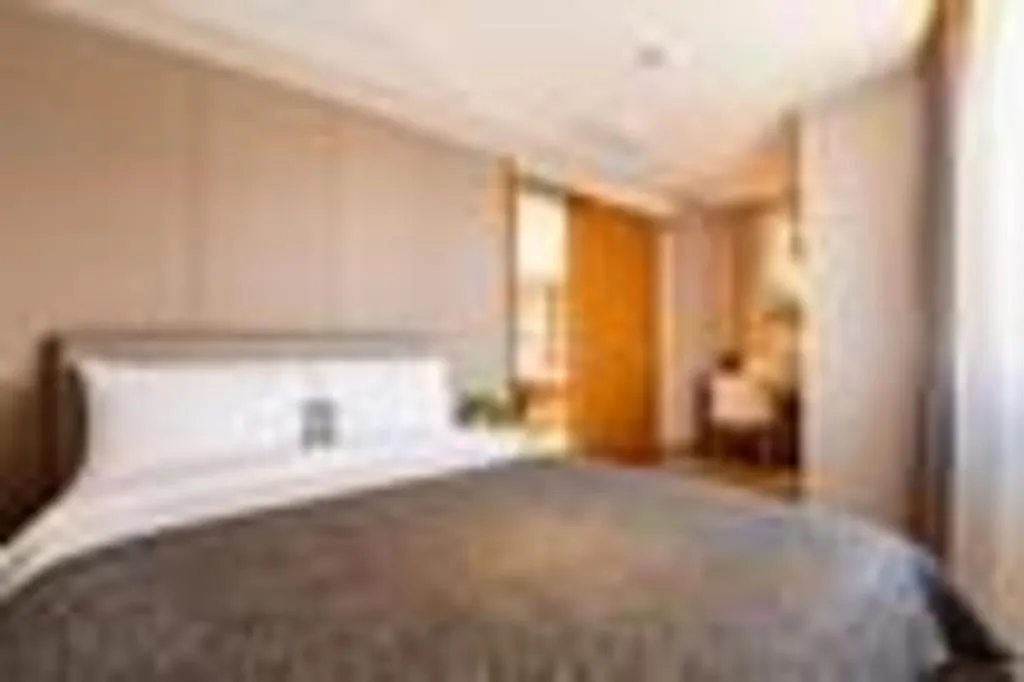 Bed in Yitel Collection Shenyang Hunnan Olympic Sports Center Caixia Street Metro Station