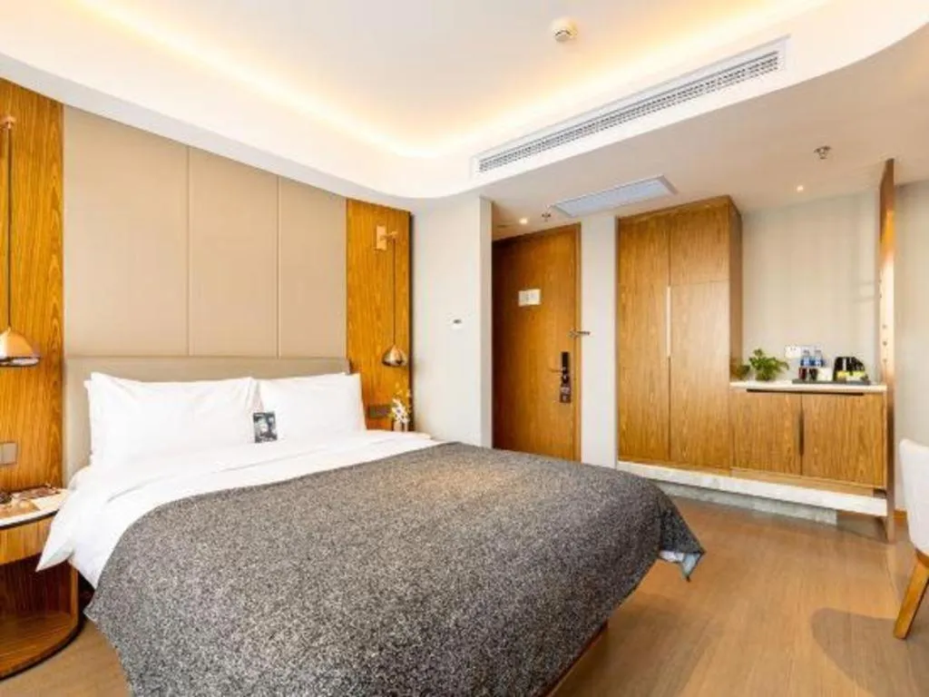 Bed in Yitel Collection Shenyang Hunnan Olympic Sports Center Caixia Street Metro Station
