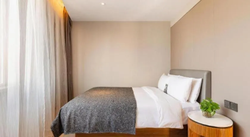 Bed in Yitel Collection Shenyang Hunnan Olympic Sports Center Caixia Street Metro Station