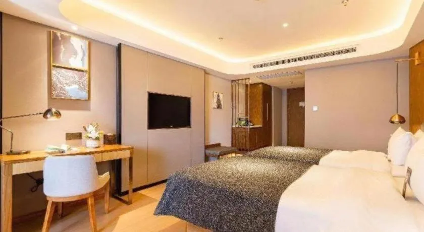 Bed in Yitel Collection Shenyang Hunnan Olympic Sports Center Caixia Street Metro Station
