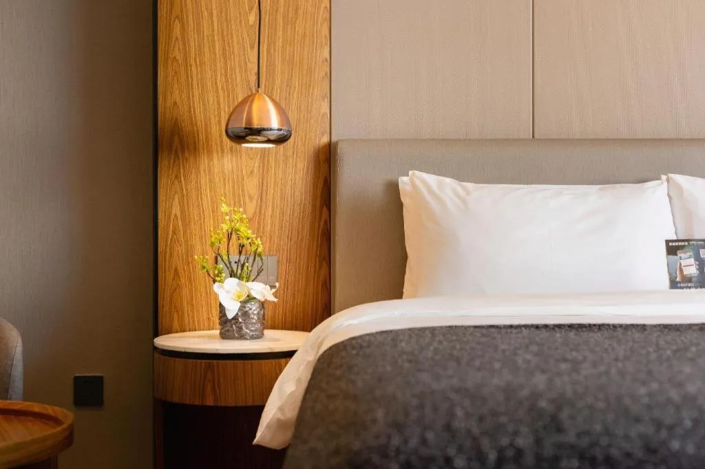 Bed in Yitel Collection Shenyang Hunnan Olympic Sports Center Caixia Street Metro Station