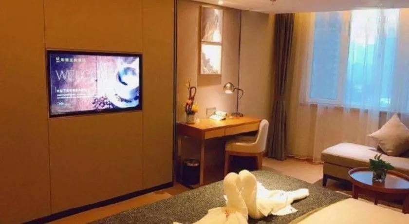 Bed in Yitel Collection Shenyang Hunnan Olympic Sports Center Caixia Street Metro Station