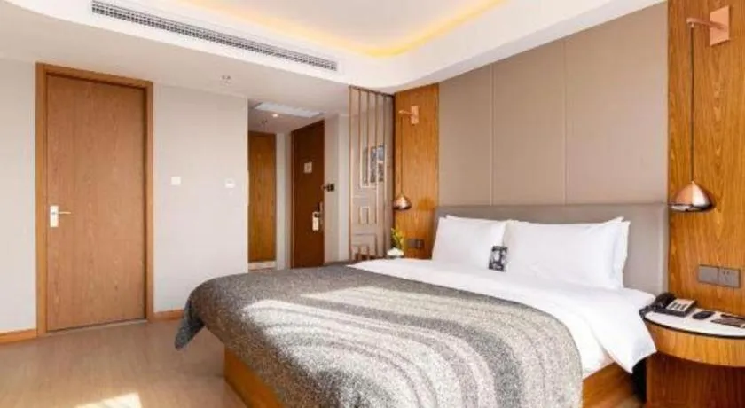 Bed in Yitel Collection Shenyang Hunnan Olympic Sports Center Caixia Street Metro Station