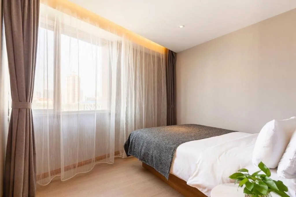 Bed in Yitel Collection Shenyang Hunnan Olympic Sports Center Caixia Street Metro Station