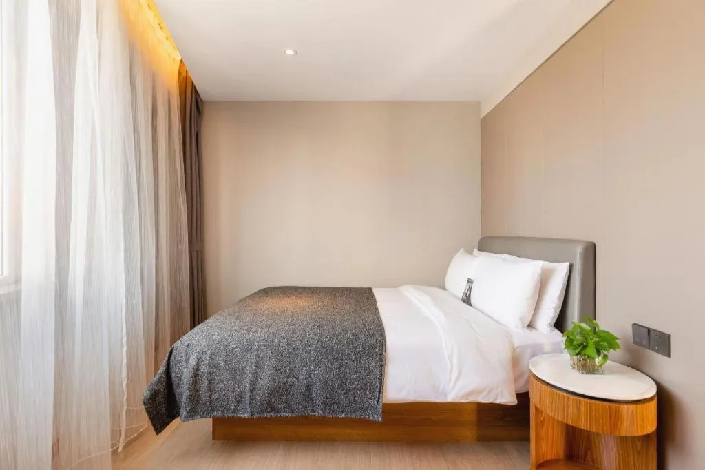 Bed in Yitel Collection Shenyang Hunnan Olympic Sports Center Caixia Street Metro Station